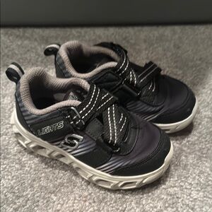 Skechers Black and White Sneakers with Light up Sole and Comfortable Padding